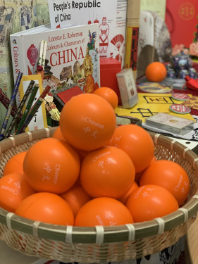 My office desk A kete of Mandarin
