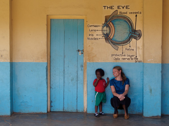 LisaHamm with a child at a vision screening day