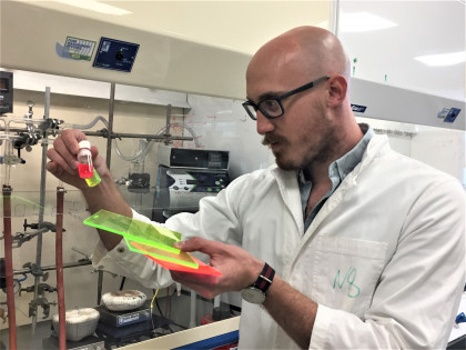 Dr Nathaniel Davis looking at some of his new solar materials