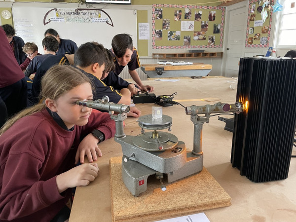 Kowhai Intermediate student looking at the spectroscope.