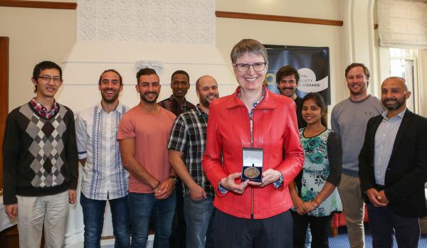 Professor Sally Brooker with most of her research team