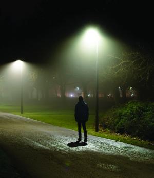 Man and street lights