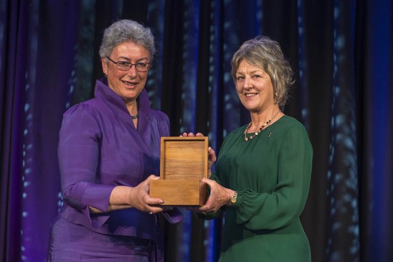 Margaret Mutu receives Pou Aronui award from Margaret Tennant 560x373