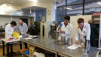 2017 Team PNBHS at the Massey University lab at Massey Uni with their mentor